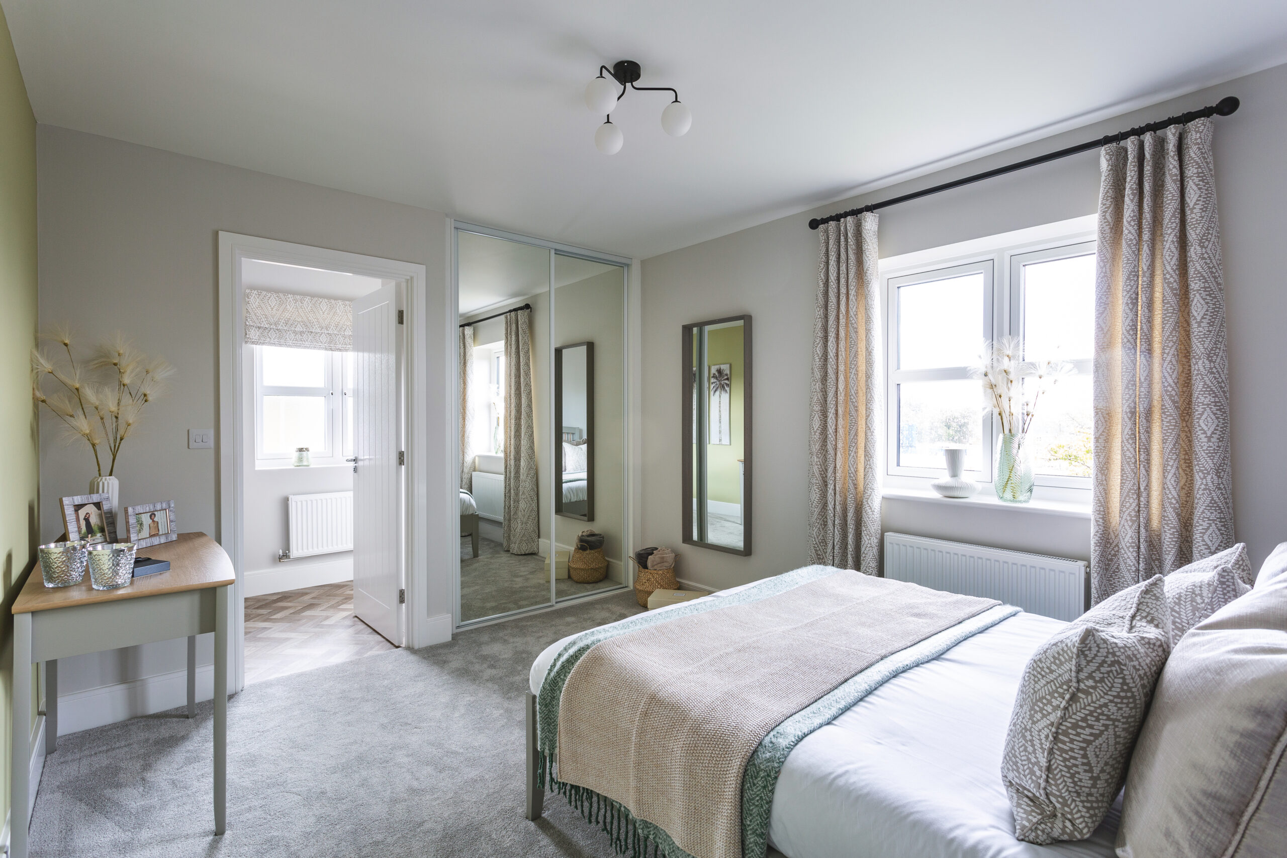Bright white sliding wardrobe with full-length plain mirror