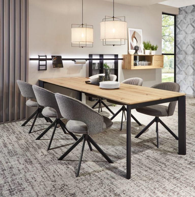 Oak dining table with wall cabinet and shelving