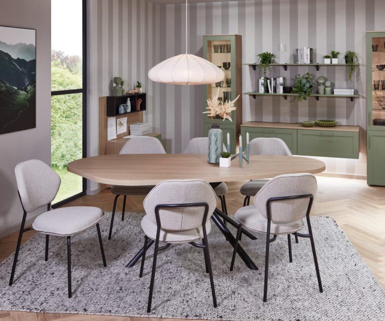 Sage green sideboard and round dining table