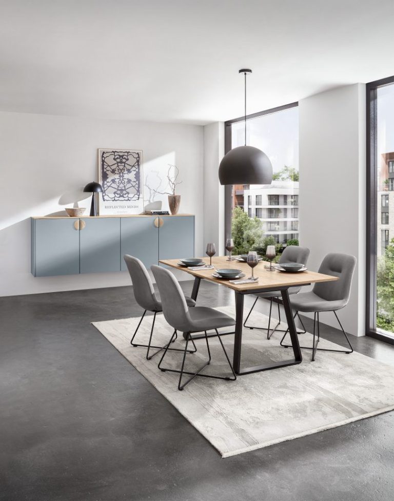 Sky blue floating sideboard in a dining area